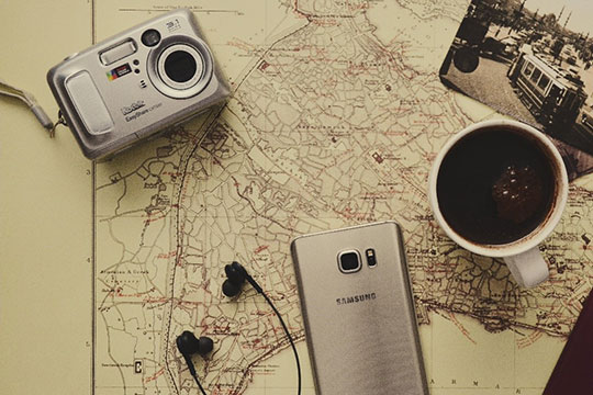 technology-gadgets-camera-phone-headphone-map-travel